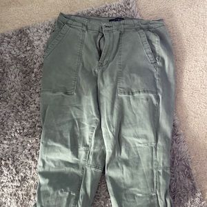 green stretchy pants